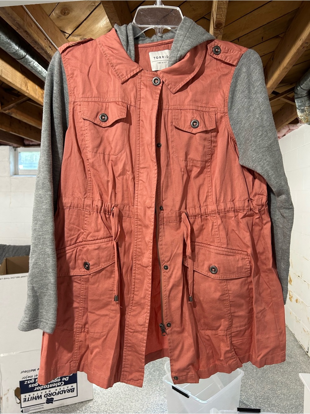 torrid coral utility jacket with gray knit hood and sleeves